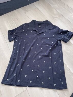 H&M Navy Polo Shirt with White Palm Tree Motif